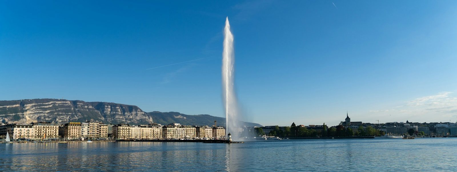body of water near buildings during daytime